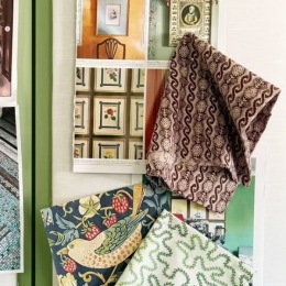 fabric samples and pictures of trinkets