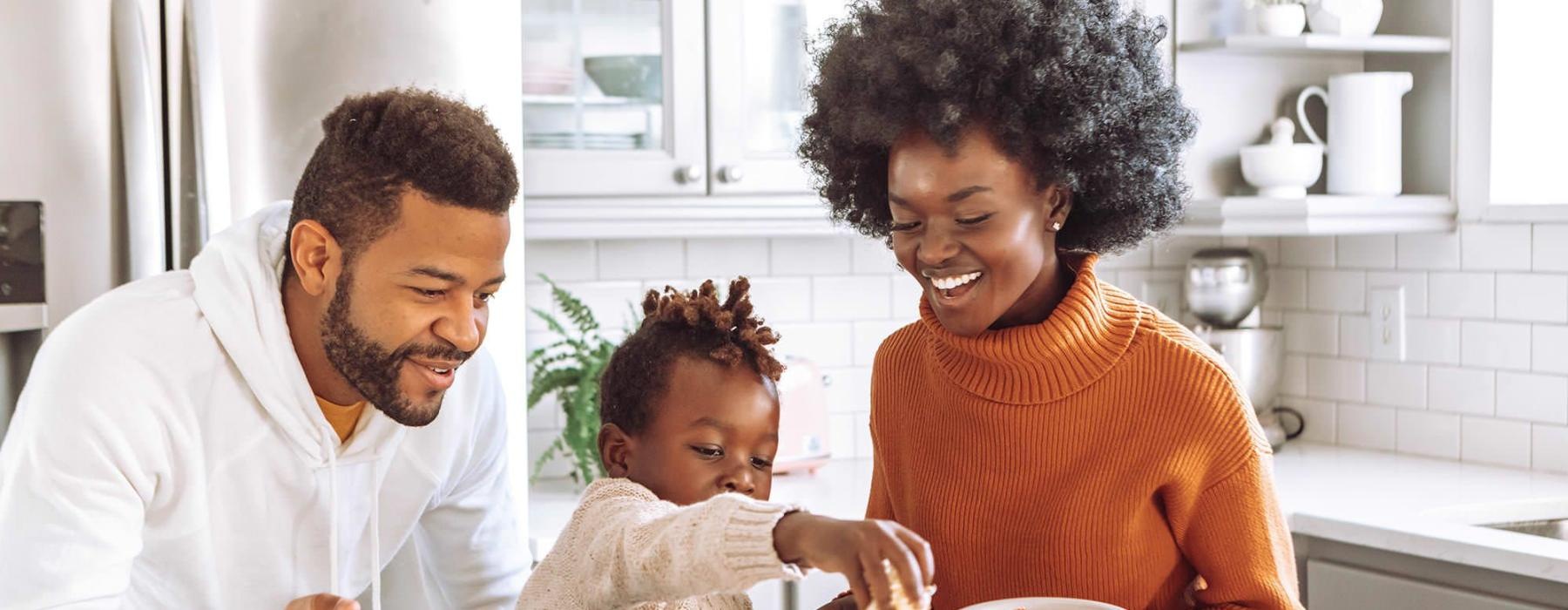 a family cooking together
