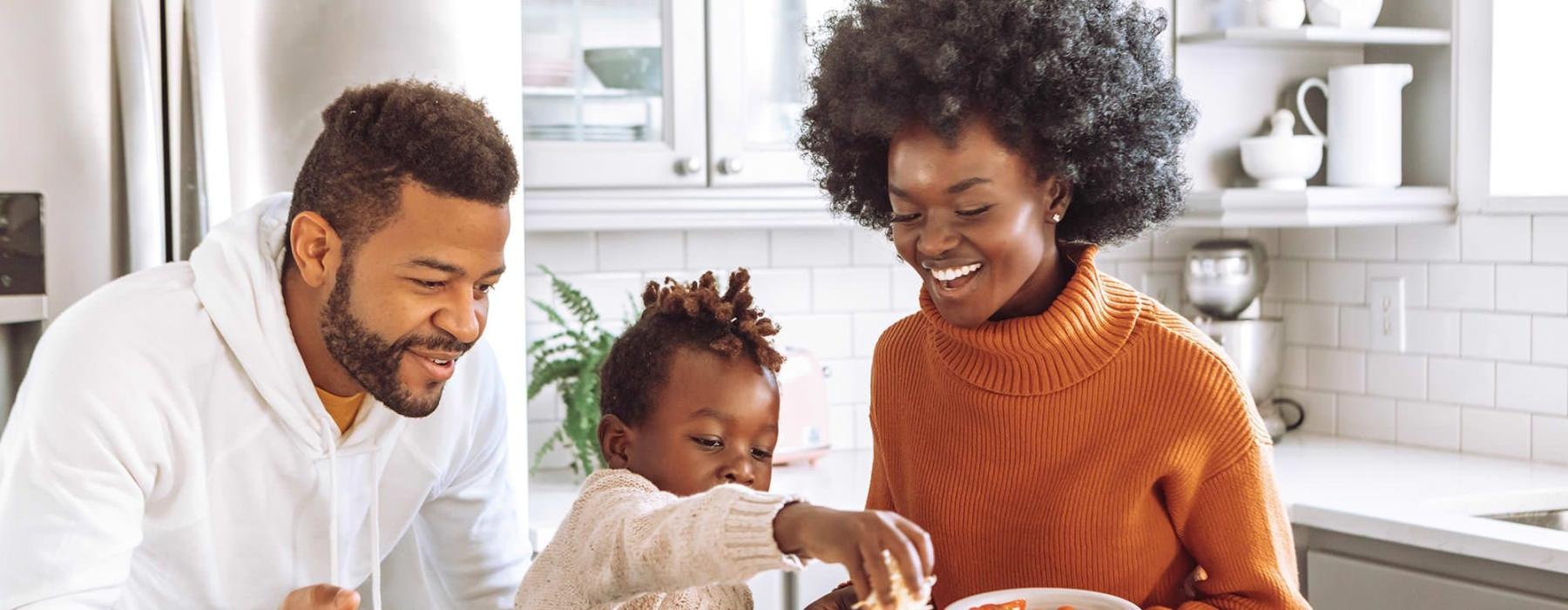 a family cooking together